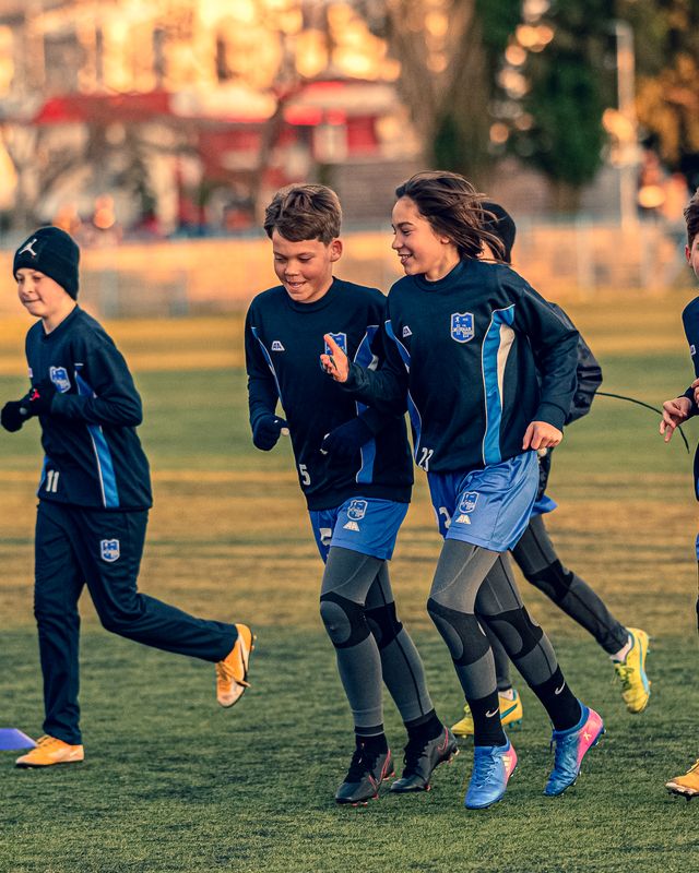 Young players warming up during a training session